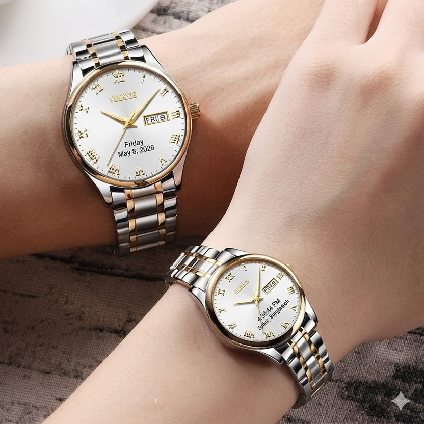 Two wrists wearing silver and gold wristwatches with detailed faces. صورة ثانوية