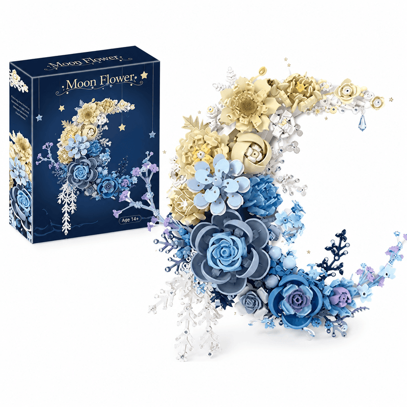 Decorative moon-shaped arrangement with flowers next to its packaging box on a white background الصورة الرئيسية