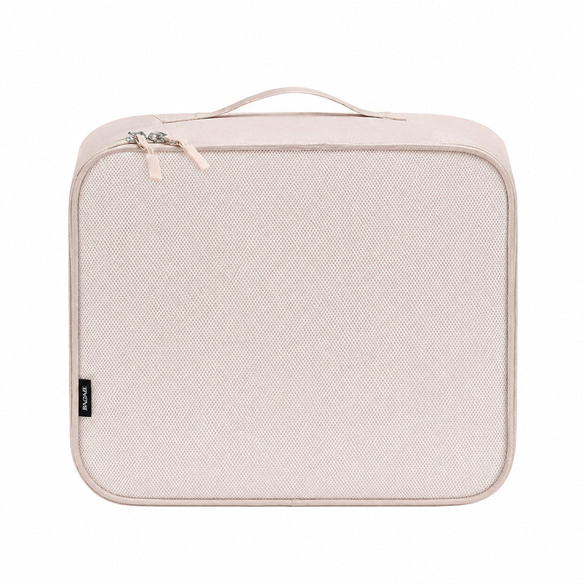 Beige travel packing cube with zipper on a white background Main image