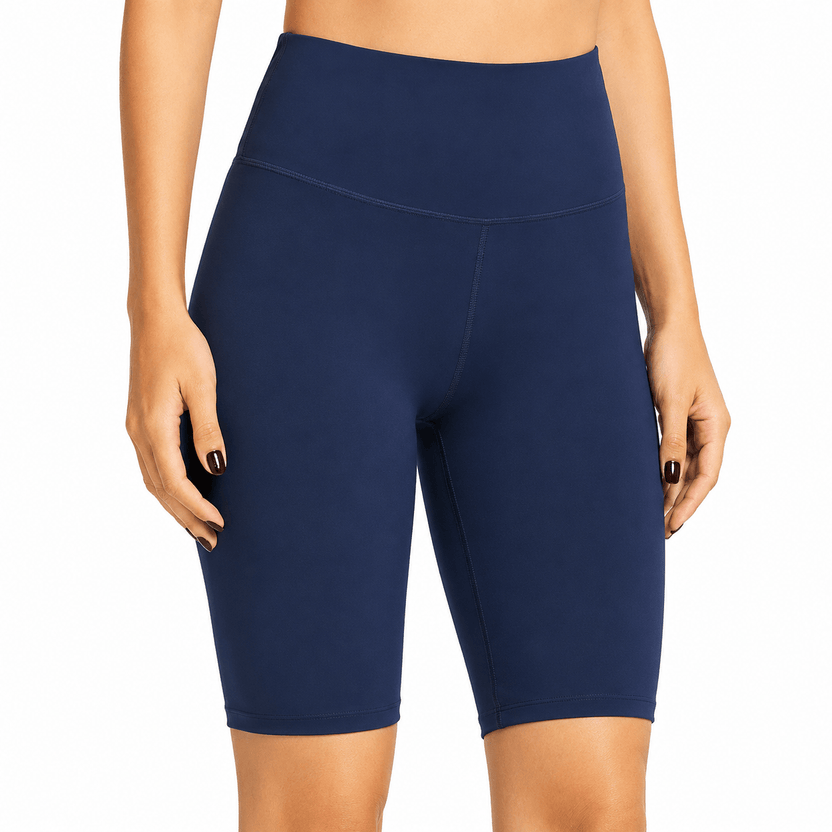 Navy blue athletic shorts worn by a person on a white background الصورة الرئيسية
