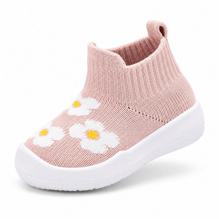 Pink children's sock shoe with daisy patterns on a white background الصورة الرئيسية
